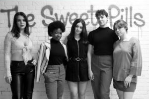 The sweet pills in front of Graffiti wall